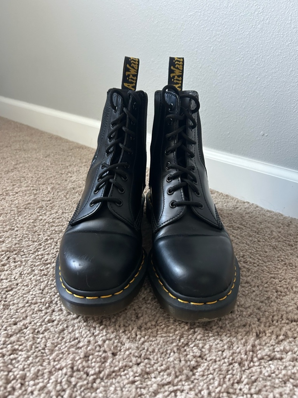 Dr. Martens Black Leather 8-Eye Lace Boots with Yellow Stitching
